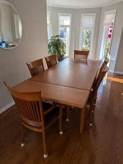 SOLID WOOD TABLE WITH 2 EXTENSIONS AND MATCHING 6 CHAIRS, View more
