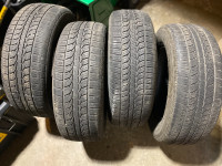 two 235/65/17 general altimax rt43 all season tires