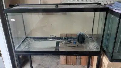90 gallon aquarium with glass lids and a metal stand 4 ft LED light a heater ,Sponge Filter with air...