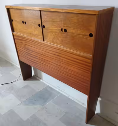 I made this headboard for my daughter's bed about 35 years ago but she has long since flown the coop...