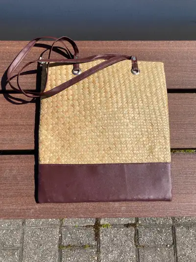 brown tote bag with some marks, View more