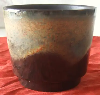 This classic West German planter was produced in the 1960s by Scheurich Keramik. On the base it is s...