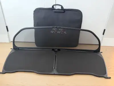 I'm selling a used windscreen designed specifically for an Audi S5 convertible. This windscreen effe...