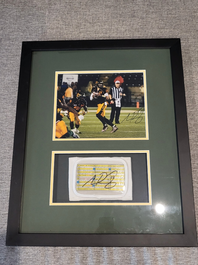 Mike Reilly signed Game worn play call wristband in Arts & Collectibles in Edmonton