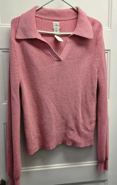 This is a used Joie brand, women's long-sleeved sweater, size large. This cotton sweater is perfect...