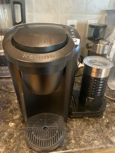 K Latte Keurig with milk frothier It comes with extra accessories for your own coffee. It still work...