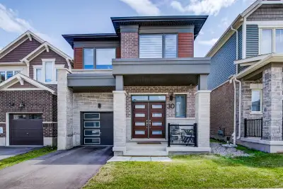 Welcome to this beautiful, modern home where thoughtful design, elegant finishes, and an abundance o...