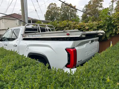 sled deck, 6.5 ft fits inside box, extends to 8ft, holds any size sled, with ramp and clamps for sle...