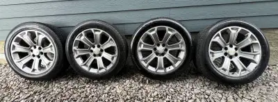 22" Chevy 7 spoke Rims on Bridgestone 275 50 22 tires Factory Chevy GM rims 6x139 22x9 Straight Hold...