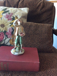 Capodimonte boy with cherries figurine, $25