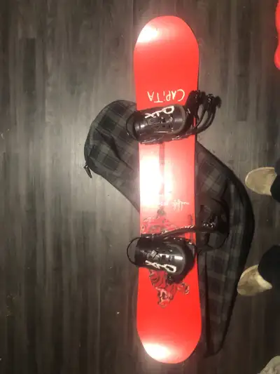 Never used Burton Board and Boots. Comes with case and bindings as well...