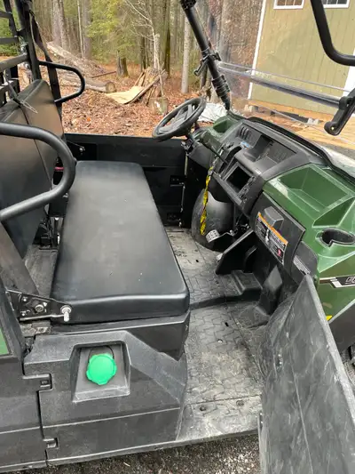 Kawasaki Mule Pro DX 1000 diesel seats 3 people has a windshield and is capable of caring 1000 Lbs i...