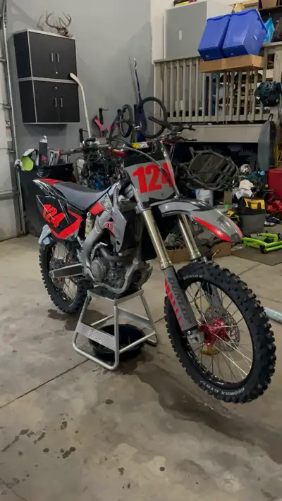 ISO. Looking for a rear shock linkage Posted picture of part I am after. Closer to red deer or Lethb...