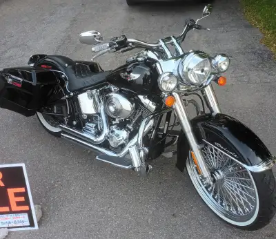 For sale, No trades thanks,,06' Harley Deluxe, Very clean,,well cared for and maintained, King spoke...