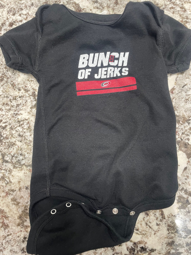 Carolina Hurricanes NHL Baby Onesie - Bunch of Jerks, 12 months  in Clothing - 9-12 Months in Oakville / Halton Region