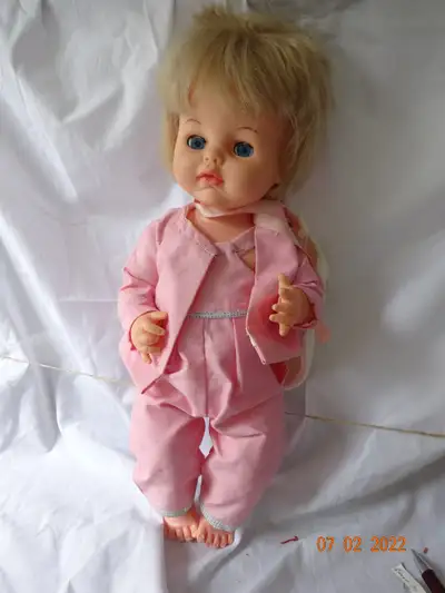 Looking for a nice sized playdoll for your child. Here is a vintage doll , plastic, jointed, sleep e...
