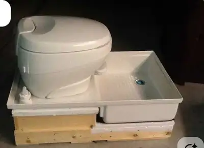 Selling a tub toilet combo pan, ideal for RVs or camping setups, noted as being in fair condition an...