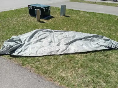 Roughly 12-13ft long and 5ft tall. Good for smaller coupes and sedans. One small hole for the antenn...