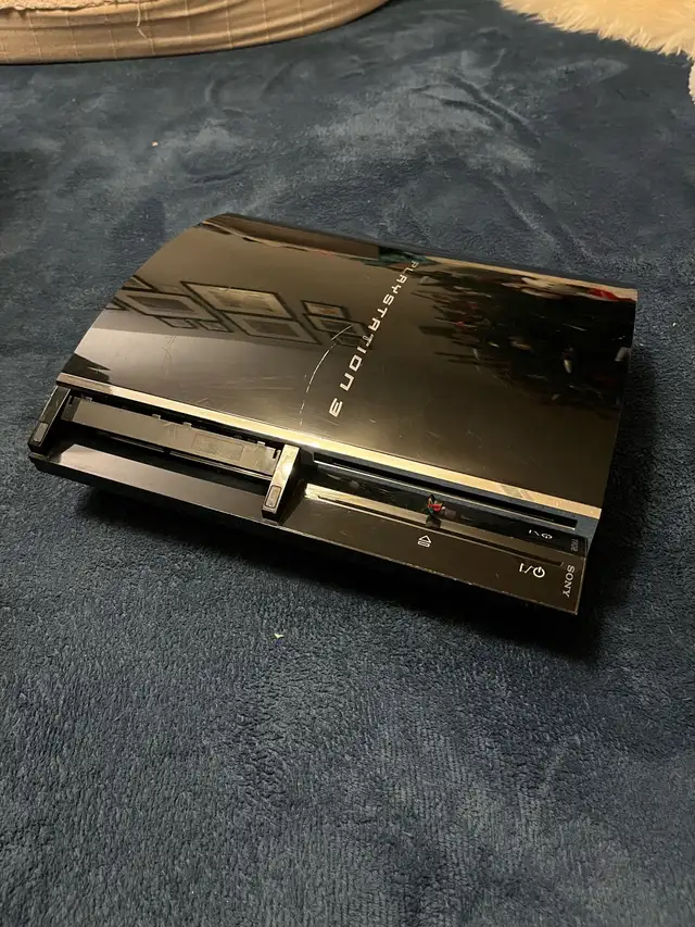 Three Video Game Consoles64985463520898124