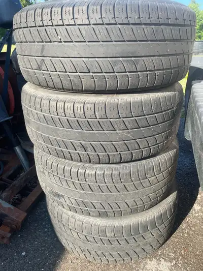 235/55R17 Uniroyal Tiger Paw Touring. Decent amount of tread left. Bit of weathering nothing serious...