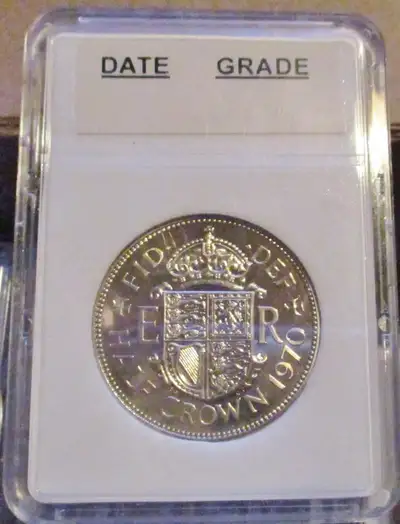 1970 UK 1/2 CROWN FROM SET, IN EXCELLENT CONDITION, IN PROTECTIVE SLAB BEAUTIFUL COIN. ANY MARKS ARE...
