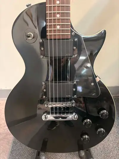 Univox black electric guitar, View more