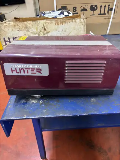 This is a used Hunter propane furnace that's ready to crank up the heat! It measures approximately 1...