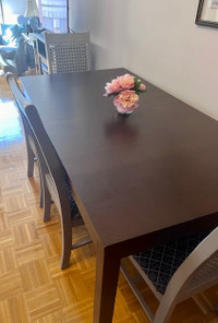 Table and chairs with extension