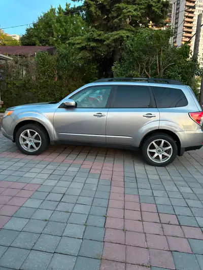2010 Subaru Forester. Silver color. Low milage. Good Condition. 6 months ago replaced battery, all b...