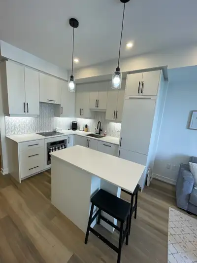 Fully Furnished All Inclusive Luxury Condo in the Heart of Kitchener/Waterloo Experience the epitome...