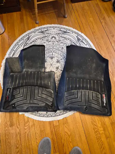 Santa Cruz Weather Tech front seat Floor Mats. Used only 2 winters. $165 valve for only $45.