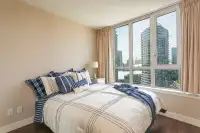 Your Gateway to Downtown Vancouver: Spacious Master Bedroom