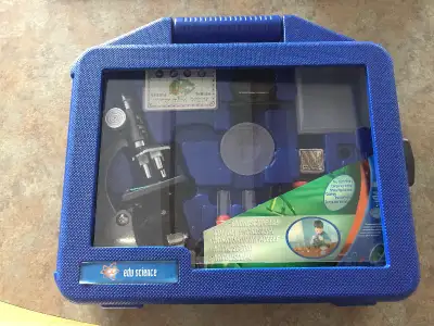 Microscope with accessories and boxed, View more