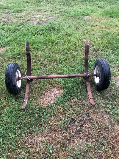 Trailer axle, springs, wheels & tires… springs are 32 inches