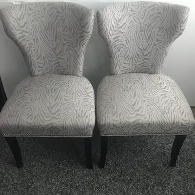 Grey fabric zebra-print armless chairs, View more