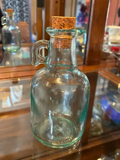 Vintage 5 1/2” high sea green glass cruet, View more