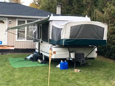 Pop up camper in great condition can sleep 6 comfortably as kitchen breakfast table and opens up the...