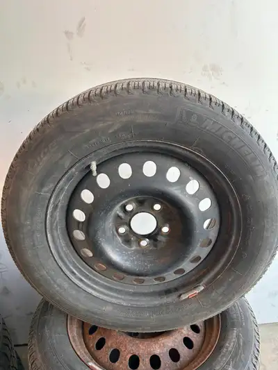 Very lightly used Michelin X-ice winter tires on steel wheels with tire pressure monitors (TPMS). Pl...