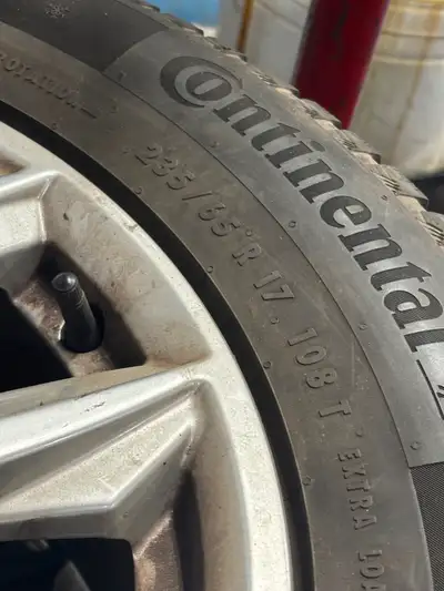 P235/65R17 Continental Winter Contact tires with Original OEM Rims. Tread depth 10/32's. Date codes...