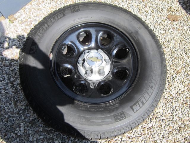 Police wheels with snow tires 265/70/17 Silverado in Tires & Rims in St. Catharines