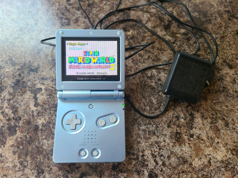 Nintendo gameboy advance sp with super mario game for sale  