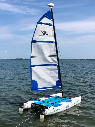 Hobie 14' Wave Catamaran sailboat in excellent shape. Sail in perfect shape. Boomless rig, mesh tram...