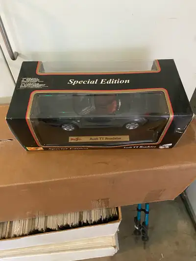 In box Maisto Audi TT Roaster 1:18 scale First weekend in June. Parade of garage sale crossfield. 24...