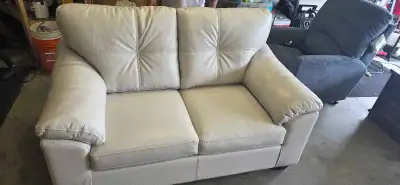 Like new leather love seat, View more