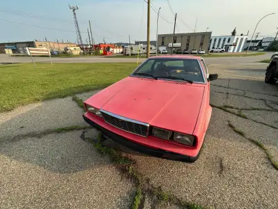 this car needs a little work and it will be back up and running, very clean car. all the parts to pu...