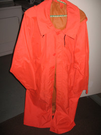 HUNTER ORANGE LONG RAIN COAT WITH HOOD CALL 506 773 4052