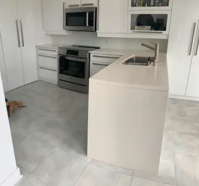 85” peninsula & butt joint waterfall panel, with undermount Blanco steel sink and Blanco faucet, 28”...