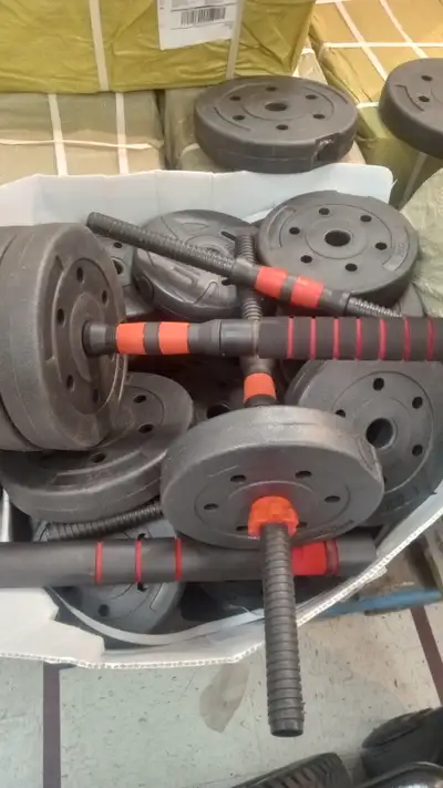 new in package with 50 kg or so and barbell and dumbbells $55 or $45 if you buy more than 1 set Than...