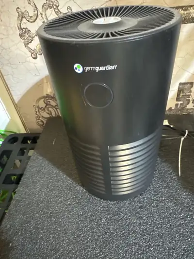 Keep your air clean with this GermGuardian air purifier, featuring a HEPA filter and UV-C light tech...