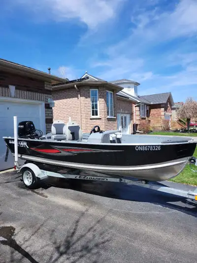 2023 Smokercraft 14ft aluminum fishing boat. Excellent condition, 25 hp Suzuki 4 stroke outboard. Fe...
